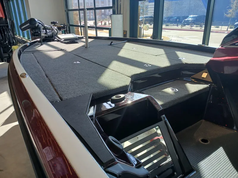Slide: The Image of 2024 Ranger Z521R Ranger Cup Equipped boat interior with spacious deck and storage compartments. - 12