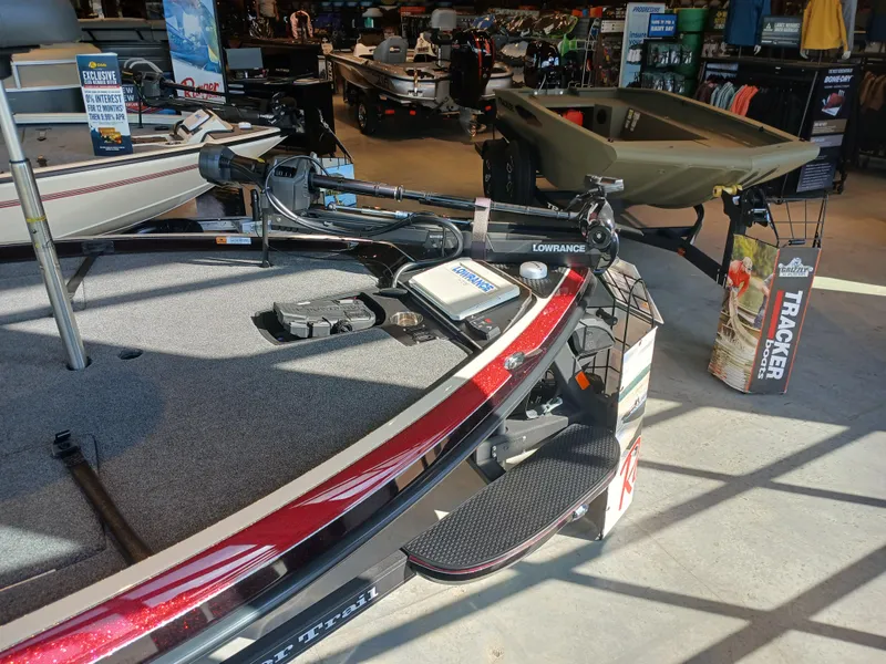 Slide: The Image of 2024 Ranger Z521R Ranger Cup Equipped boat displayed in a showroom with accessories. - 13