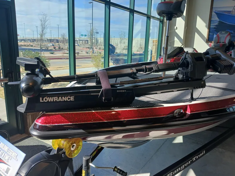 Slide: The Image of 2024 Ranger Z521R boat with Lowrance equipment, displayed indoors. - 15