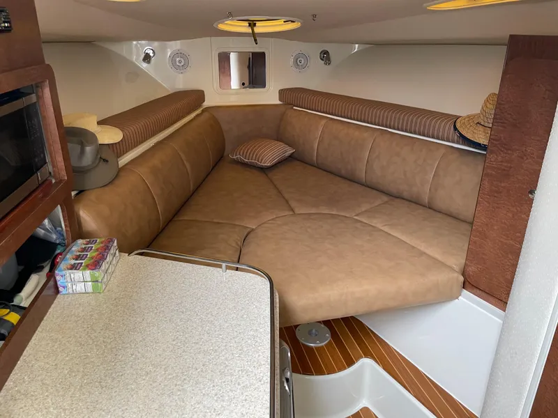 Slide: The Image of 2008 Hydra-Sports 3500VX cabin interior with leather seating and wooden flooring. - 25