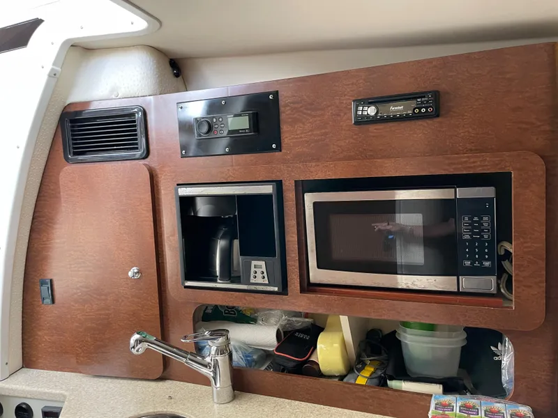 Slide: The Image of 2008 Hydra-Sports 3500VX interior kitchen with microwave, coffee maker, and sink. - 27