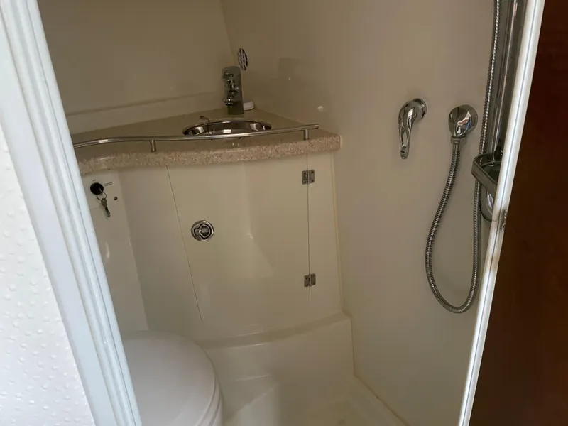 Slide: The Image of 2008 Hydra-Sports 3500VX boat bathroom with sink and shower. - 29