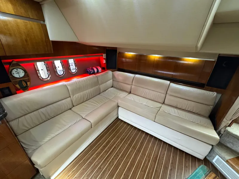 Slide: The Image of Luxurious interior of 2006 Cruisers Yachts 420 Express with leather seating and wood flooring. - 22