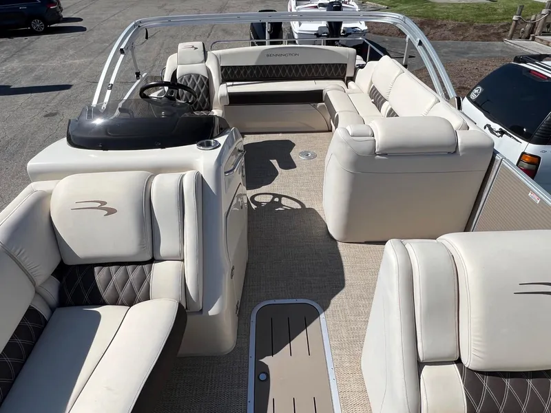 Slide: The Image of 2020 Bennington R 25 RSB pontoon boat with luxurious seating and helm station. - 4