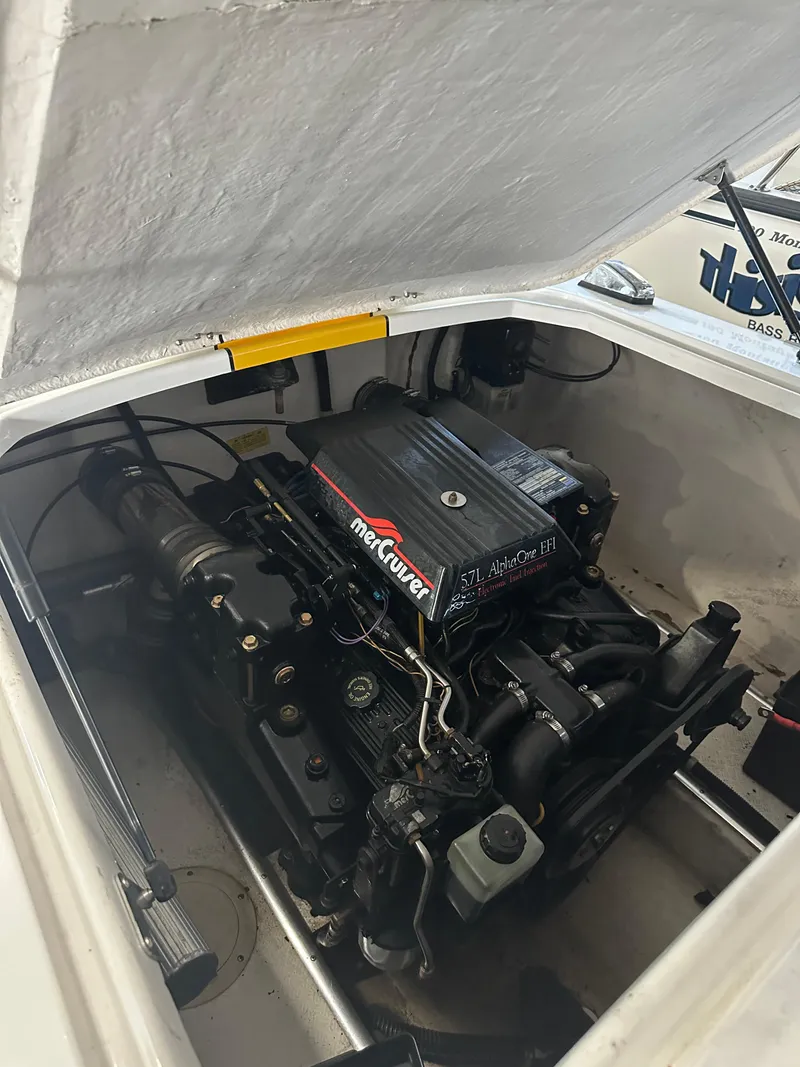 Slide: The Image of 1995 Donzi 22 Classic boat engine compartment with MerCruiser engine. - 10