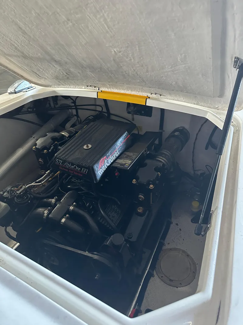 Slide: The Image of 1995 Donzi 22 Classic engine compartment with open hatch. - 11