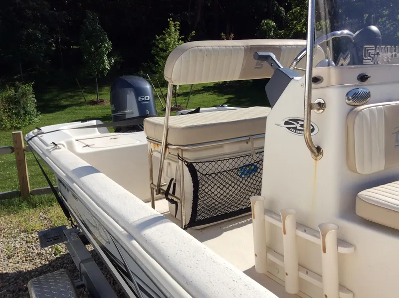 Slide: The Image of 2016 Carolina Skiff JUX 16 boat with seating and outboard motor. - 5