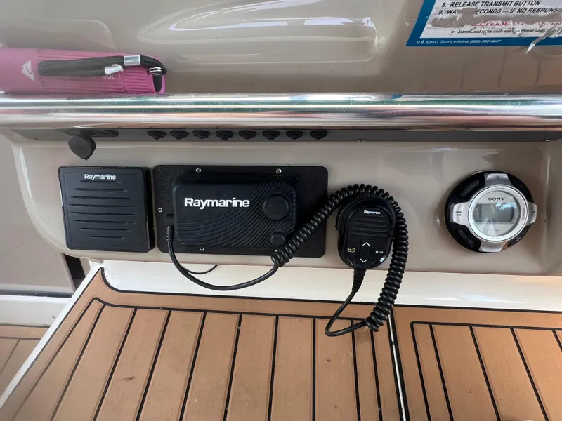 Slide: The Image of Control panel of a 1998 Sea Ray 330 Sundancer with Raymarine equipment. - 10