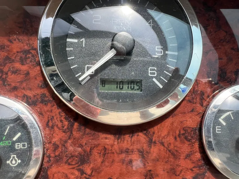 Slide: The Image of Close-up of 1998 Sea Ray 330 Sundancer boat tachometer showing 1010.5 hours. - 18