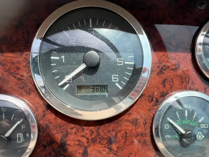 Slide: The Image of Close-up of 1998 Sea Ray 330 Sundancer RPM gauge showing 368.8 hours. - 19