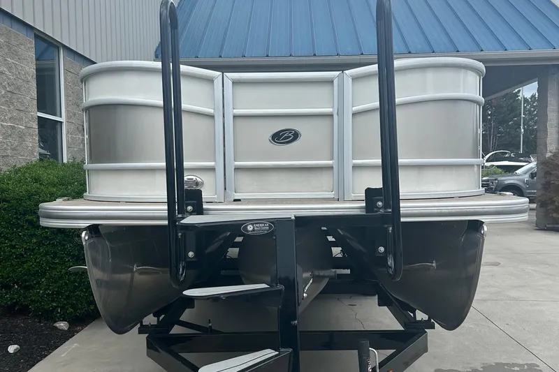 Slide: The Image of 2019 Barletta L25U pontoon boat on a trailer, front view. - 3