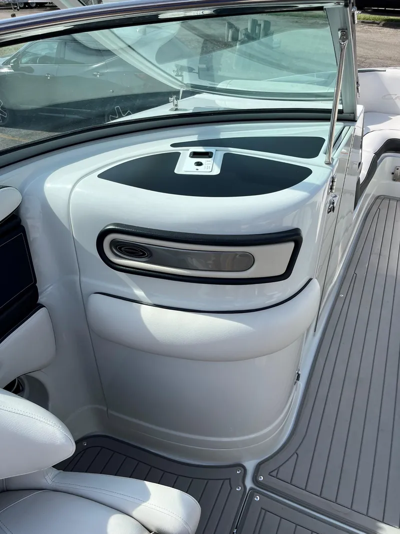 Slide: The Image of 2019 Crownline 265 SS SURF boat interior with sleek design and modern features. - 10