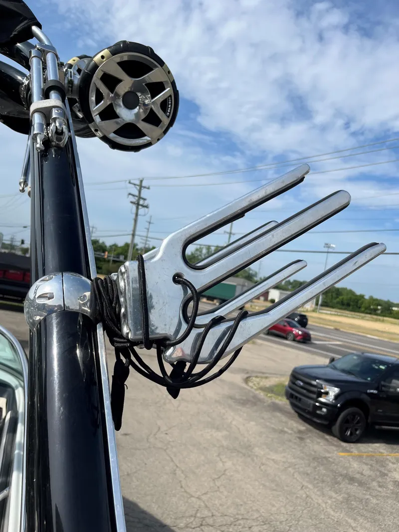 Slide: The Image of Wakeboard rack and speakers on a 2019 Crownline 265 SS SURF boat. - 13