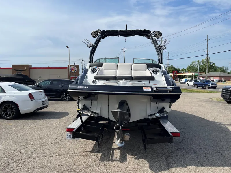 Slide: The Image of 2019 Crownline 265 SS SURF boat on a trailer, rear view. - 17