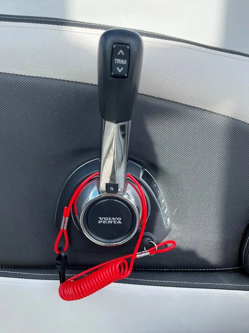 Slide: The Image of 2019 Crownline 265 SS SURF boat throttle control with Volvo Penta branding. - 9