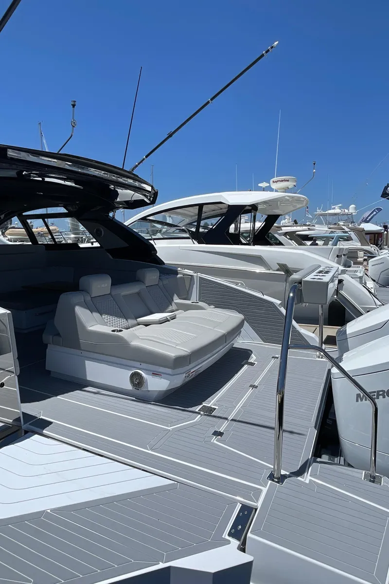 Slide: The Image of 2024 Cruisers Yachts 42GLS luxury boat with spacious deck and modern design. - 2