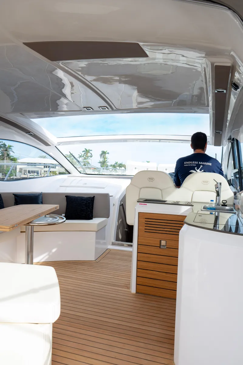 Slide: The Image of 2024 Sessa Marine C44 Cruiser kitchen with modern appliances and sleek design. - 16