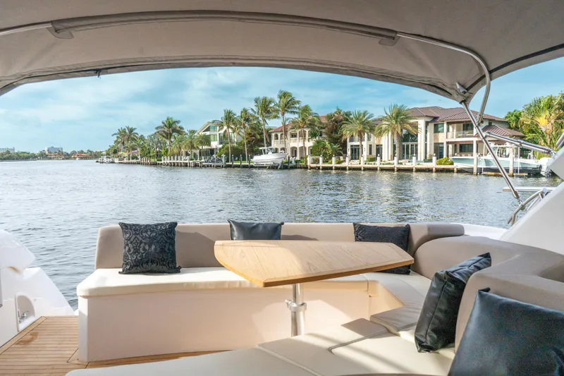 Slide: The Image of 2024 Sessa Marine C44 Cruiser interior with modern wood finish and sleek design. - 18