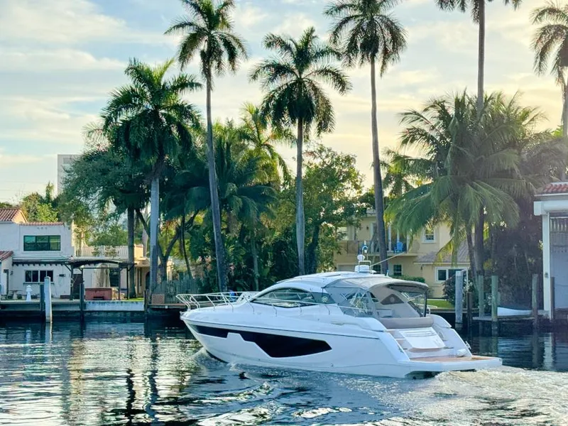 Slide: The Image of 2024 Sessa Marine C44 Cruiser interior with modern seating and helm. - 2