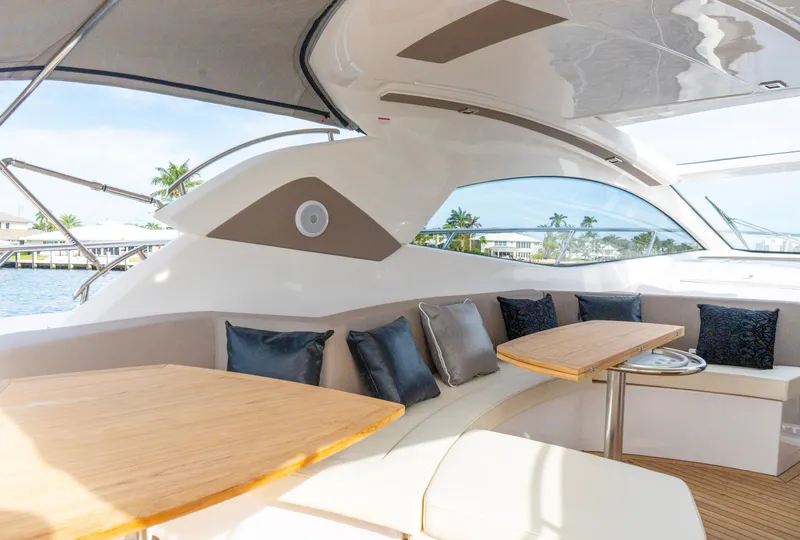 Slide: The Image of 2024 Sessa Marine C44 Cruiser on calm water at sunset. - 20