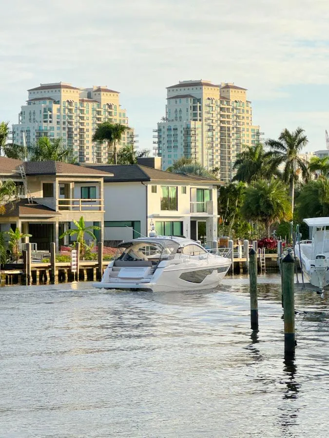 Slide: The Image of 2024 Sessa Marine C44 Cruiser with outdoor kitchen and sleek design. - 4