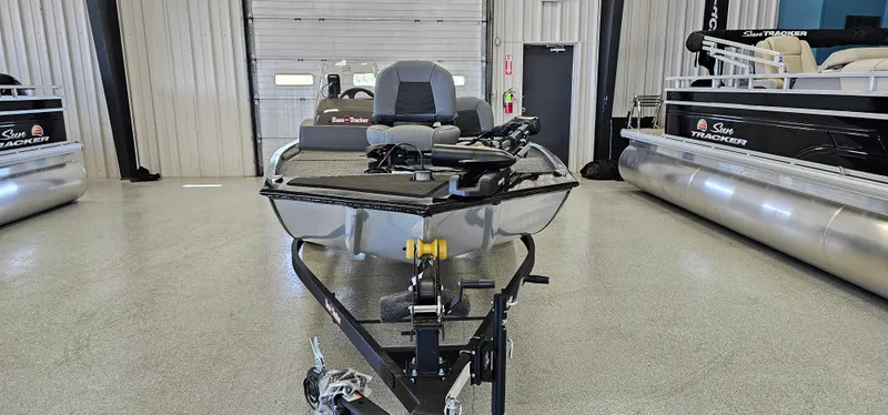 Slide: The Image of 2024 Tracker Bass Tracker Classic XL boat in showroom, front view. - 2