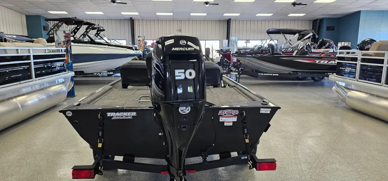 Slide: The Image of 2024 Tracker Bass Tracker Classic XL boat with Mercury 50 engine in showroom. - 3