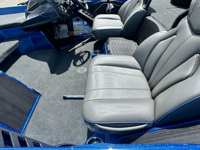 Slide: The Image of 2024 Skeeter ZXR21 boat interior with gray seats and steering console. - 3