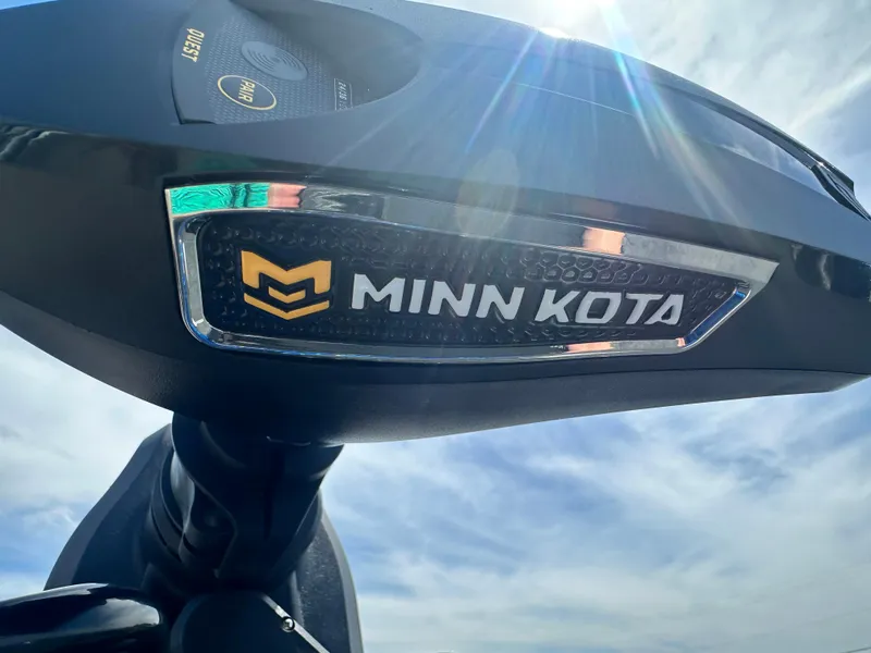 Slide: The Image of Close-up of Minn Kota motor on 2024 Skeeter ZXR21 boat under sunny sky. - 6