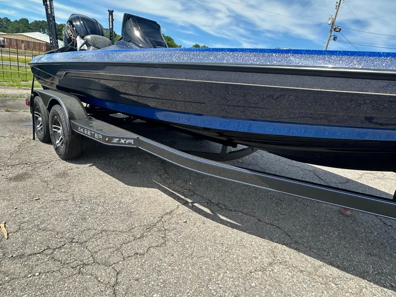 Slide: The Image of 2024 Skeeter ZXR21 boat on a trailer, side view. - 9