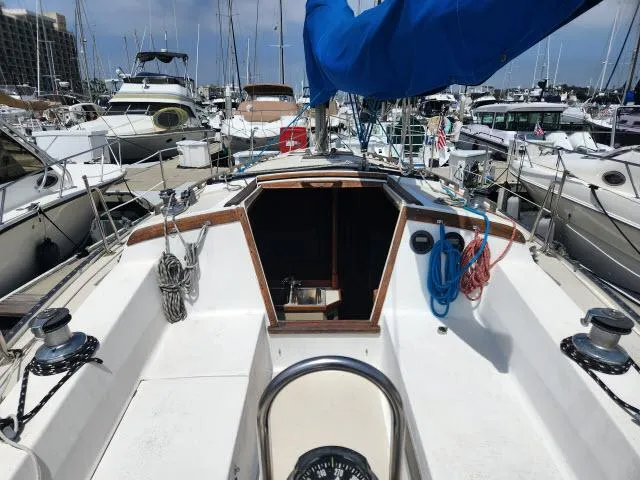 Slide: The Image of 1985 Catalina 36 sailboat cockpit view in marina. - 24