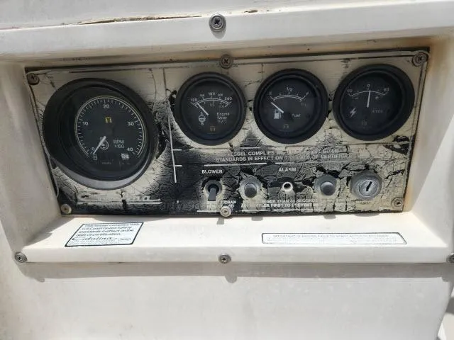 Slide: The Image of Control panel of a 1985 Catalina 36 sailboat with gauges and switches. - 30