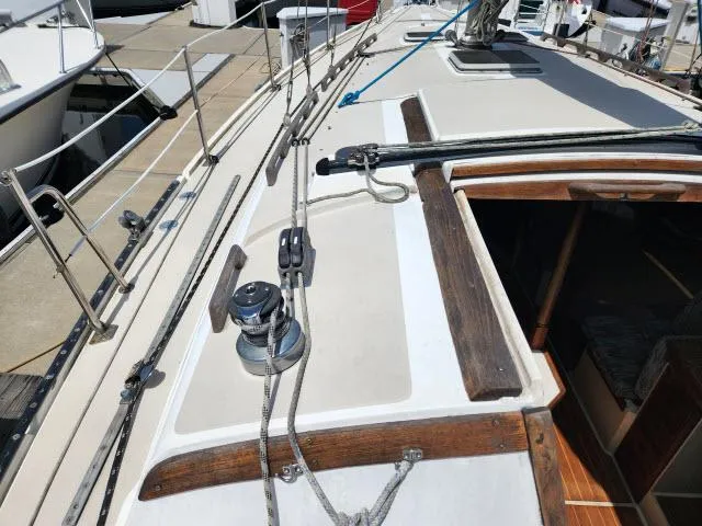 Slide: The Image of 1985 Catalina 36 sailboat deck with winch and rigging. - 32