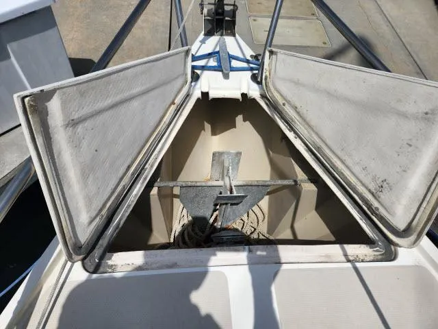Slide: The Image of Anchor locker of a 1985 Catalina 36 sailboat with open hatches. - 36