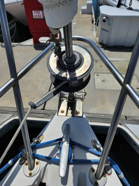 Slide: The Image of Bow of 1985 Catalina 36 sailboat with anchor and winch system. - 38