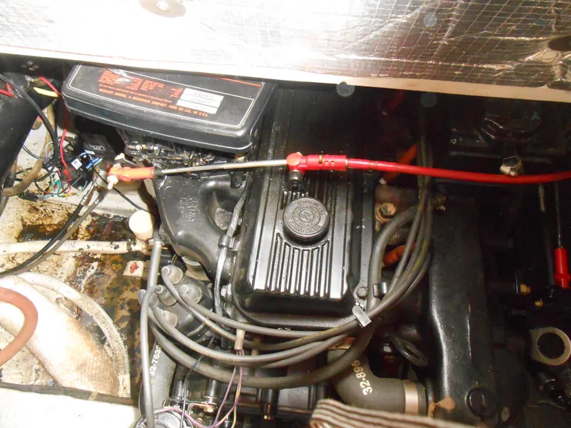 Slide: The Image of 1989 Cooper Marine Prowler 9m engine compartment with visible wiring and components. - 18