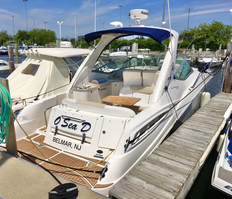 Slide: The Image of 2010 Sea Ray 330 Sundancer docked in Belmar, NJ marina. - 3