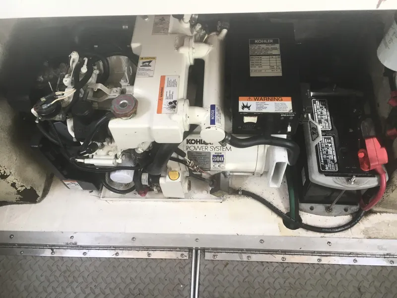Slide: The Image of Engine compartment of 2010 Sea Ray 330 Sundancer with Kohler power system. - 38