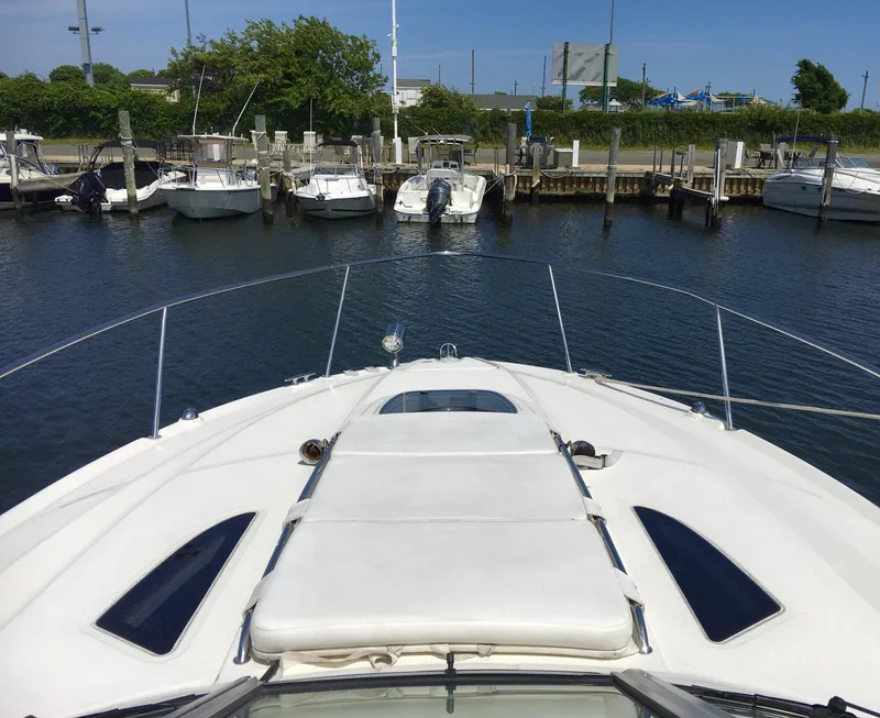 Slide: The Image of Bow view of 2010 Sea Ray 330 Sundancer docked at marina. - 6