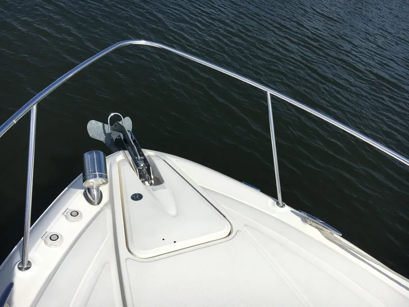 Slide: The Image of Bow of 2010 Sea Ray 330 Sundancer yacht on calm water. - 7