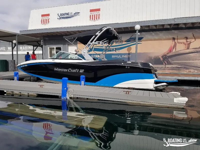 Slide: The Image of 2018 MasterCraft XT 22 boat docked at Boating Lake Mead marina. - 4