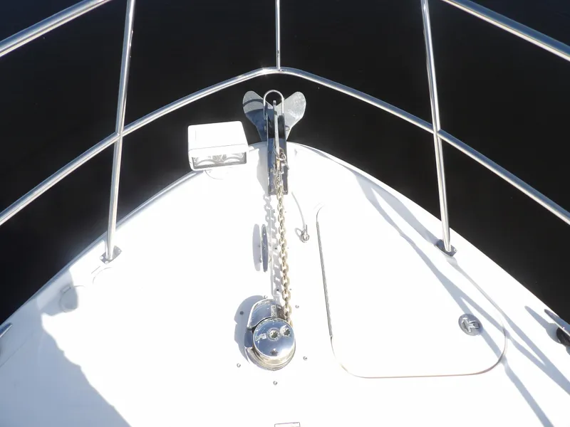 Slide: The Image of Bow of 2005 Sea Ray 390 Sundancer with anchor and windlass. - 10