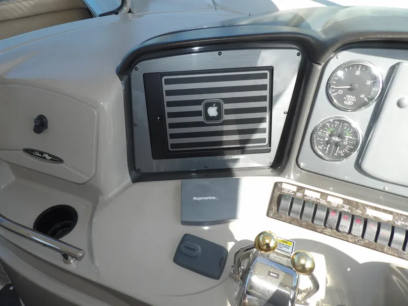 Slide: The Image of Control panel of a 2005 Sea Ray 390 Sundancer boat with navigation instruments. - 21