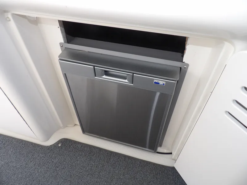 Slide: The Image of Built-in refrigerator on a 2005 Sea Ray 390 Sundancer yacht. - 28