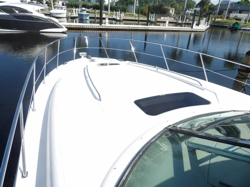 Slide: The Image of 2005 Sea Ray 390 Sundancer yacht bow view at marina. - 7