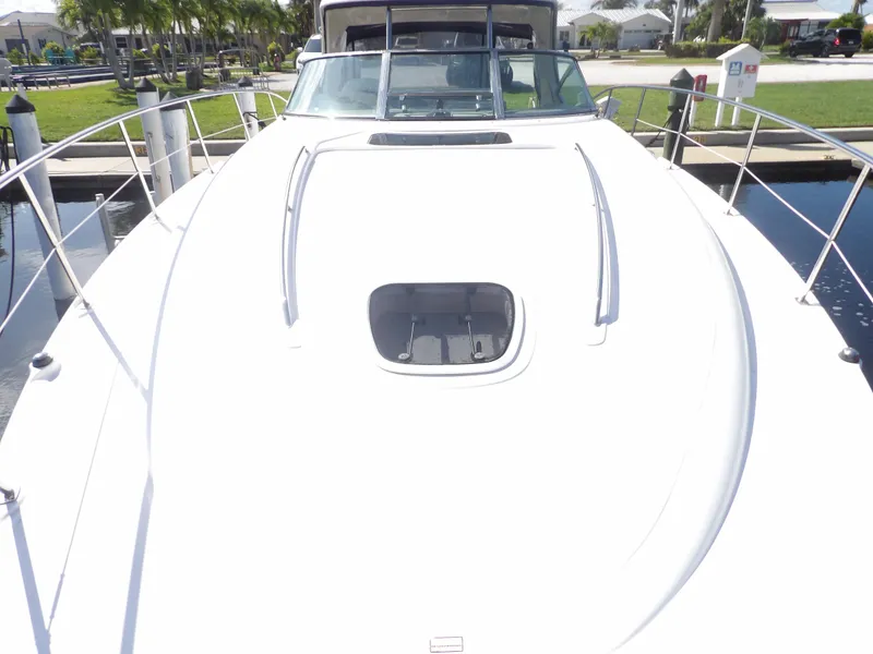 Slide: The Image of 2005 Sea Ray 390 Sundancer yacht bow view at dock. - 8