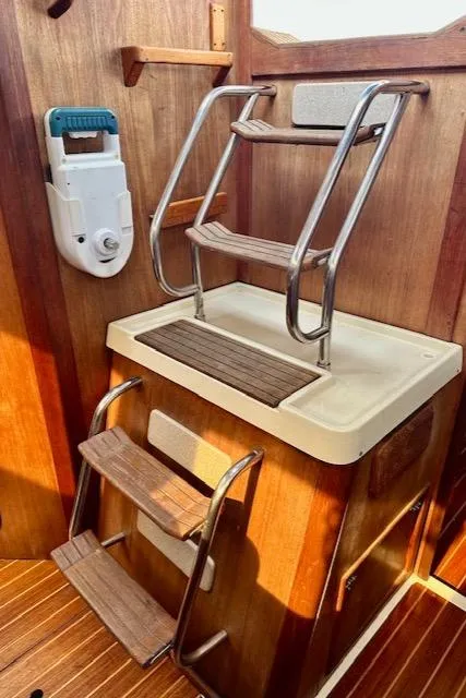 Slide: The Image of Interior of 1993 Hunter Legend 40.5 sailboat with wooden steps and stainless steel handrails. - 14