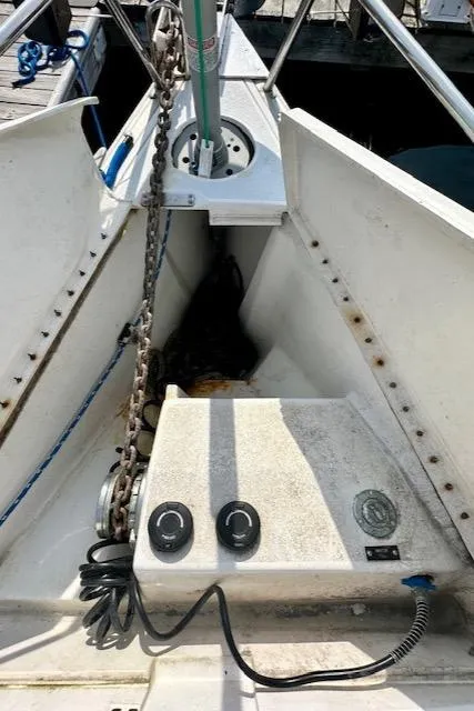 Slide: The Image of Deck of 1993 Hunter Legend 40.5 sailboat with anchor chain and controls. - 32