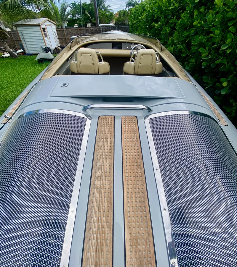 Slide: The Image of 2008 Porsche Fearless 28 boat with sleek design and luxurious seating. - 5