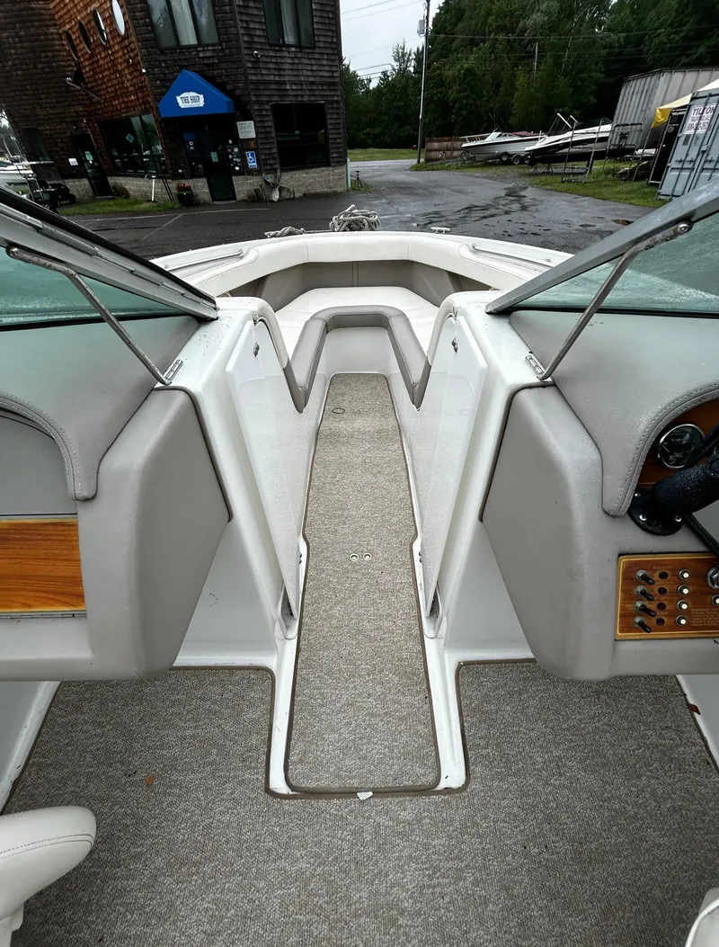 Slide: The Image of Interior view of a 2001 Cobalt 226 boat showing the bow seating area. - 29